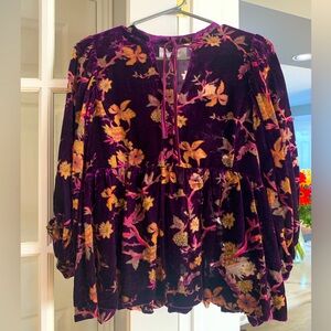 Gorgeous velvet blouse with a bit of translucent makes this blouse stunning